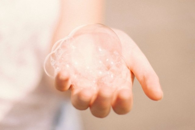 person holding a bubble