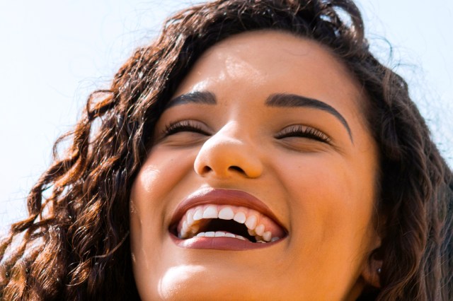 brunette woman smiling 