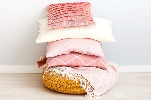 a pile of pink pillows