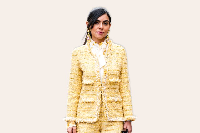 Liliane Franklin Sanders wears yellow tweed blazer with matching shorts, fuchsia bag, outside Giambattista Valli