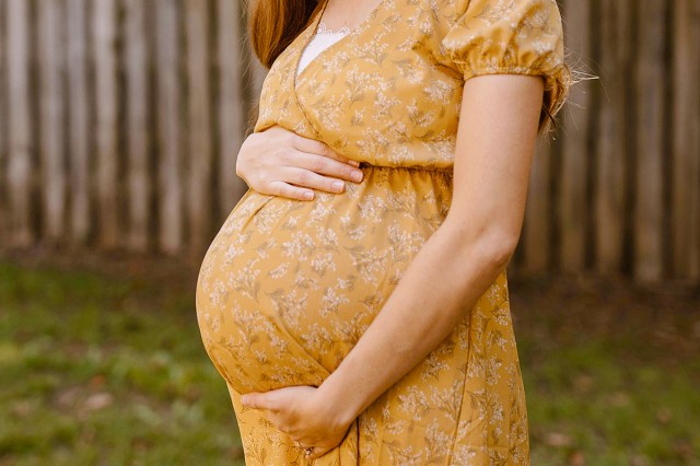pregnant woman in yellow dress 