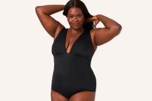 Black woman wearing black swimsuit