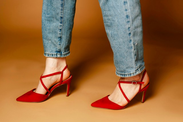 light jeans and pointed red heels