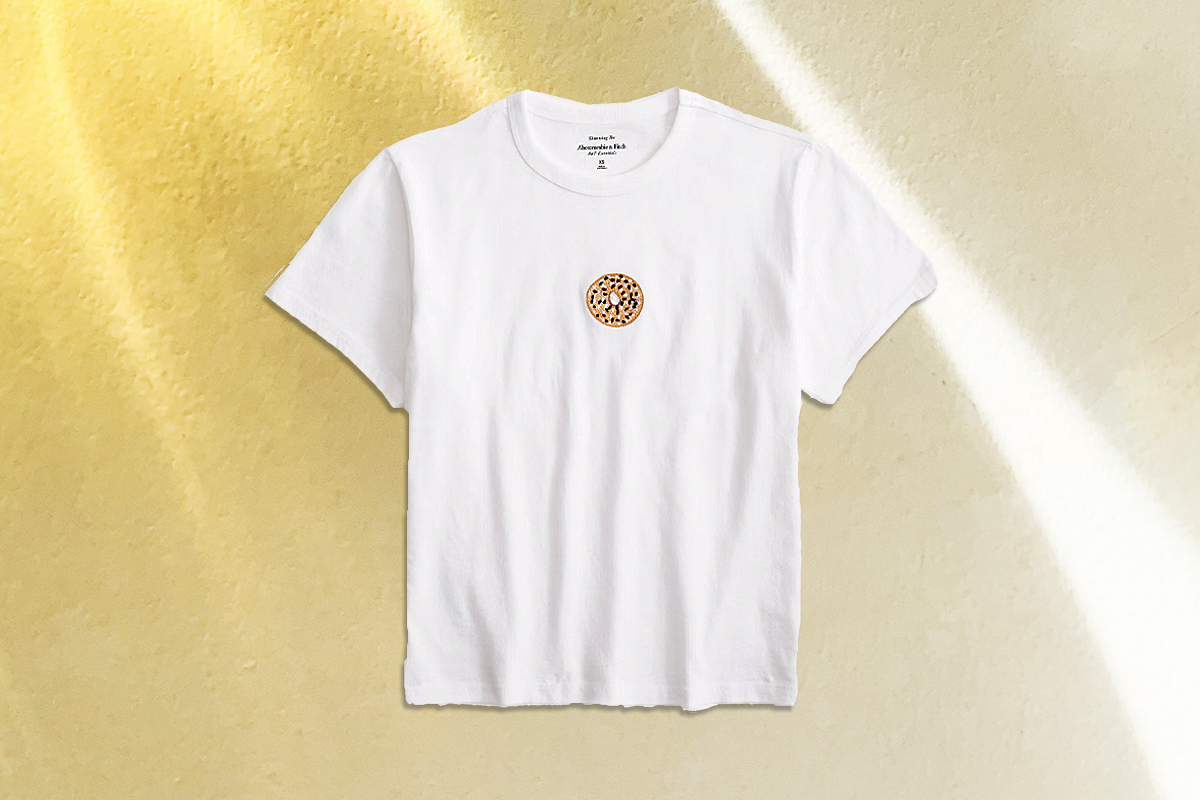 photo of a white Tee with a bagel on it 