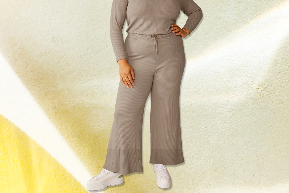 photo of a grey jumpsuit from neck down
