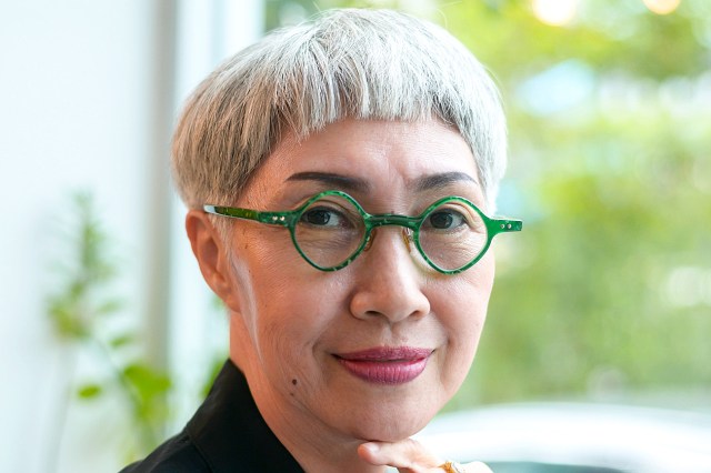 Portrait of senior businesswoman in coffee shop