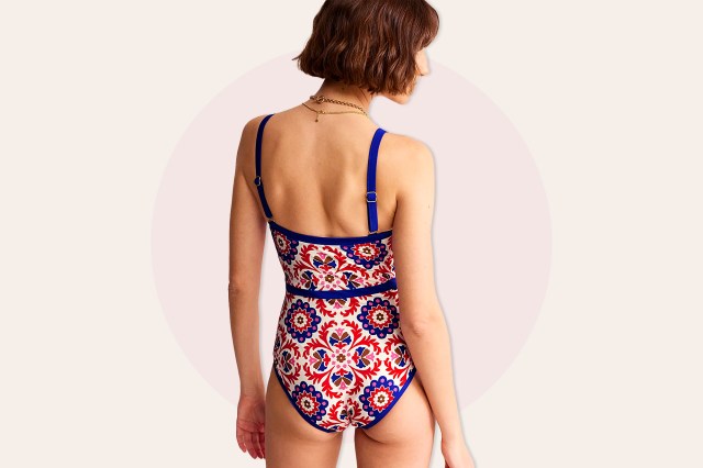 Image of brunette woman in one-piece mosaic pattern bathing suit