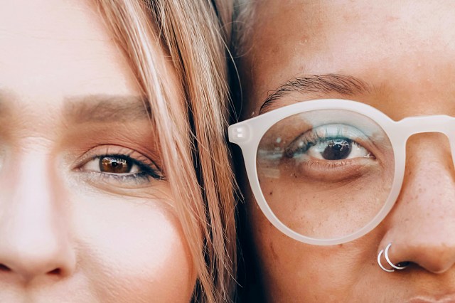 woman wearing white framed eyeglasses