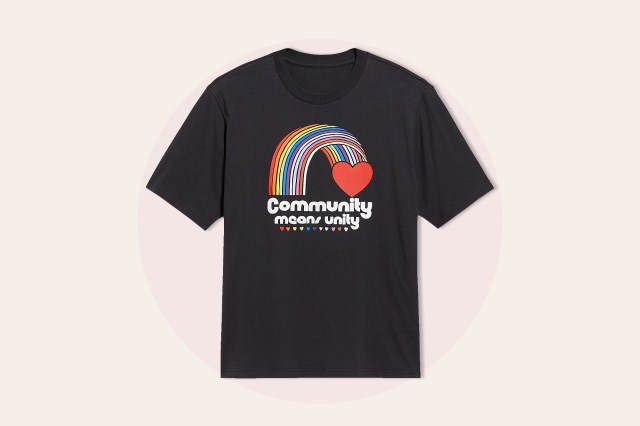 Black t-shirt that reads Community Means Unity