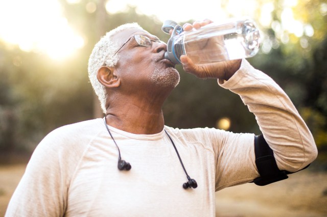 Senior African American Man Drinking Water 