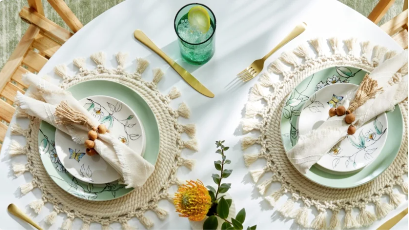 White table with  botannica dinnerware set