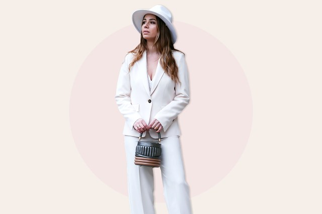 Maria Rosaria Rizzo wears a white EMME by Marella suit