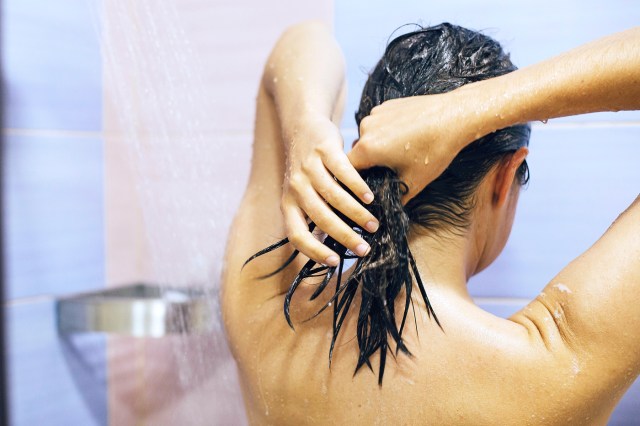 woman washing her hair 
