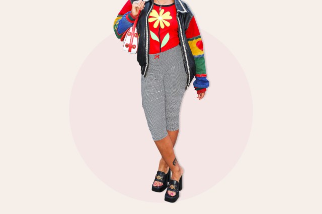 Person wearing colorful jacket and patterned capris