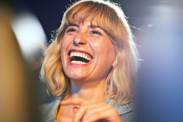 Woman smiling, laughing