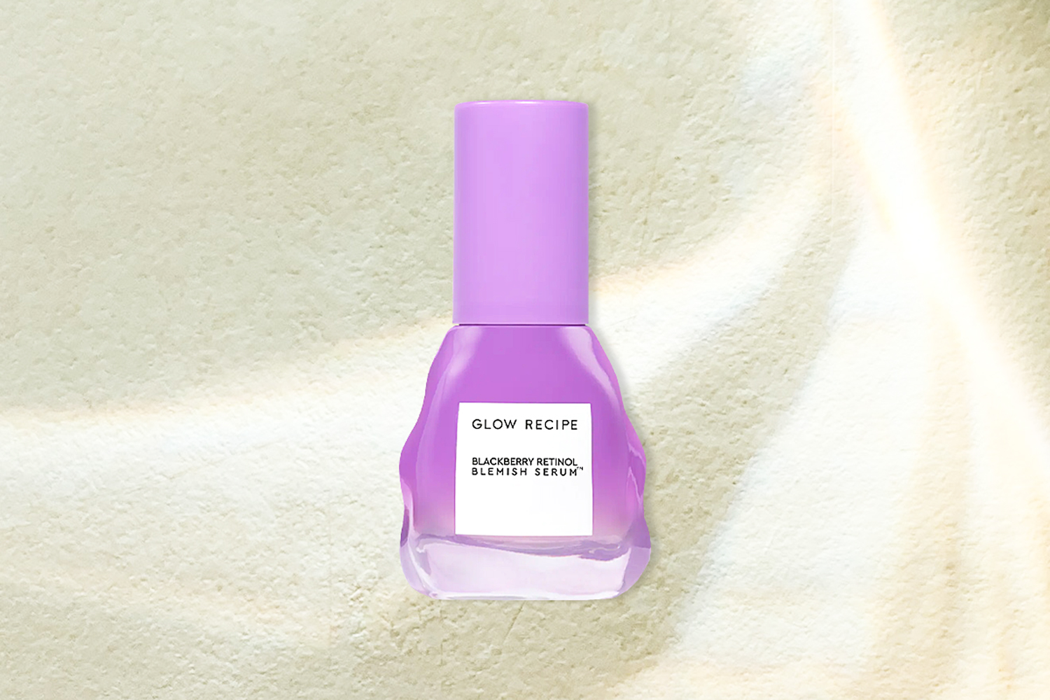 purple bottle of skincare