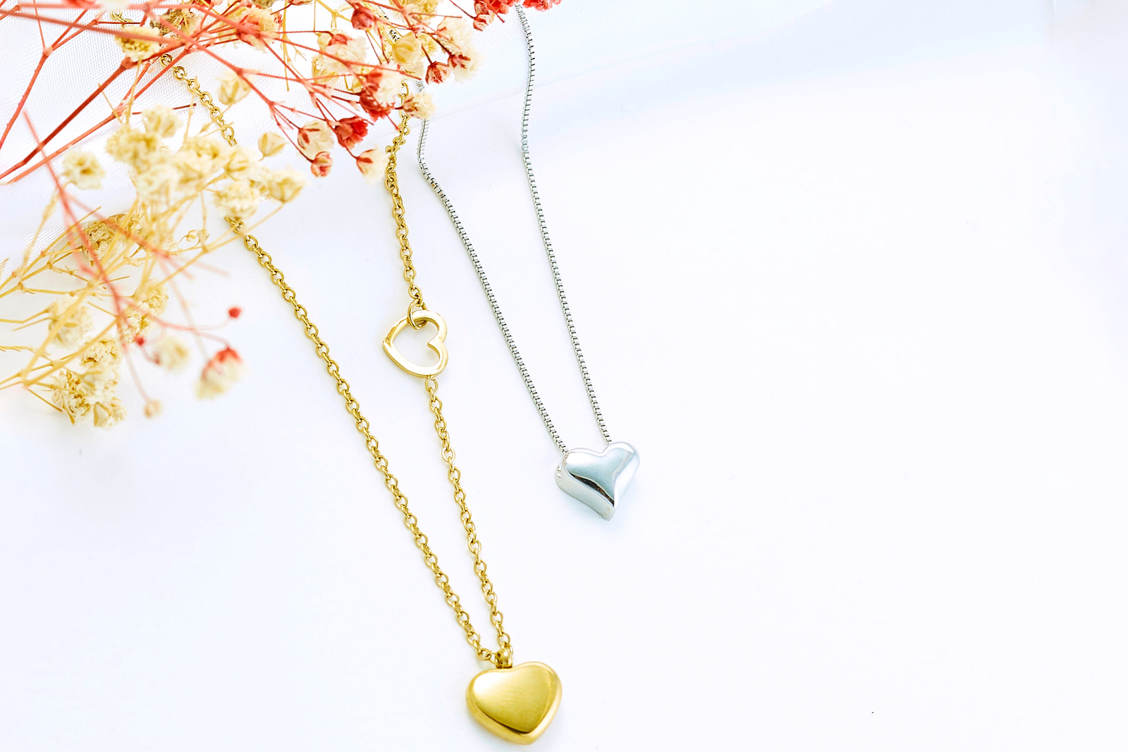 a gold and silver necklace 